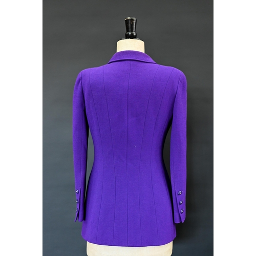 935 - Chanel Boutique - A long purple fitted wool single breasted jacket with double lapel collar and brea... 