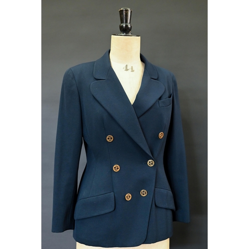 936 - Chanel Boutique - A navy fine wool double breasted blazer with double lapels, pockets and gilt metal... 