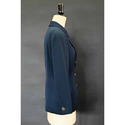 936 - Chanel Boutique - A navy fine wool double breasted blazer with double lapels, pockets and gilt metal... 