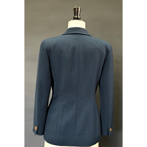 936 - Chanel Boutique - A navy fine wool double breasted blazer with double lapels, pockets and gilt metal... 