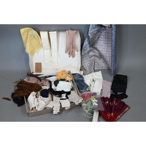 940 - Vintage textiles and accessories including a selection of leather lady's gloves, silk stockings, var... 