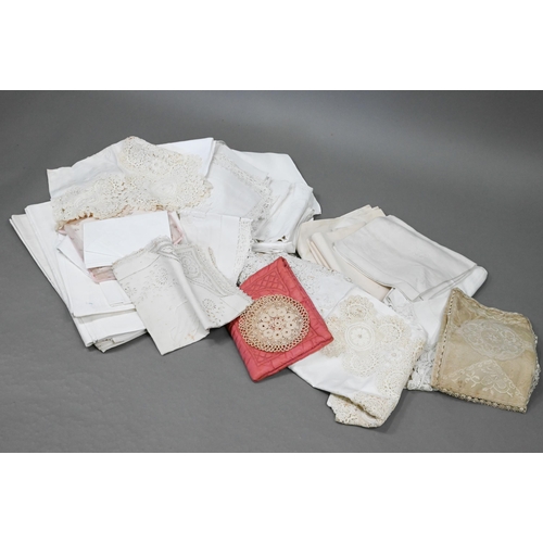 941 - A collection of vintage white table linen including napkins, doilies, table cloths, some monogrammed... 