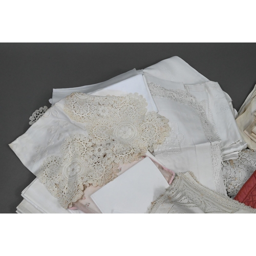 941 - A collection of vintage white table linen including napkins, doilies, table cloths, some monogrammed... 