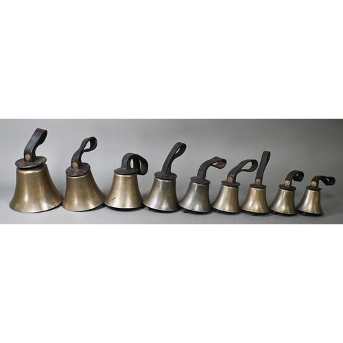 969 - A graduated matched set of nine hand-bells with leather wrist straps, some stamped for Mears and Sha... 