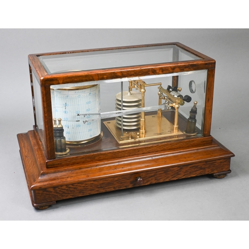 974 - A Negretti & Zambra dual-stylus barograph/thermograph, the glazed oak case with lower drawer con... 