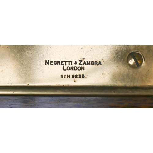 974 - A Negretti & Zambra dual-stylus barograph/thermograph, the glazed oak case with lower drawer con... 