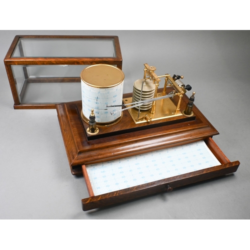 974 - A Negretti & Zambra dual-stylus barograph/thermograph, the glazed oak case with lower drawer con... 