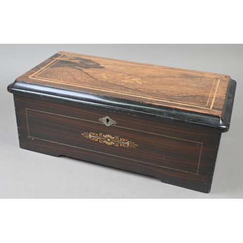 975 - An inlaid rosewood Swiss musical box with clockwork movement playing six airs, 36 cm wide