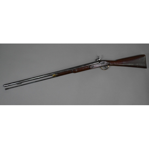 957 - An 1858 pattern 'Tower' musket with percussion action 82 cm barrel, brass-mounted walnut half-stock,... 