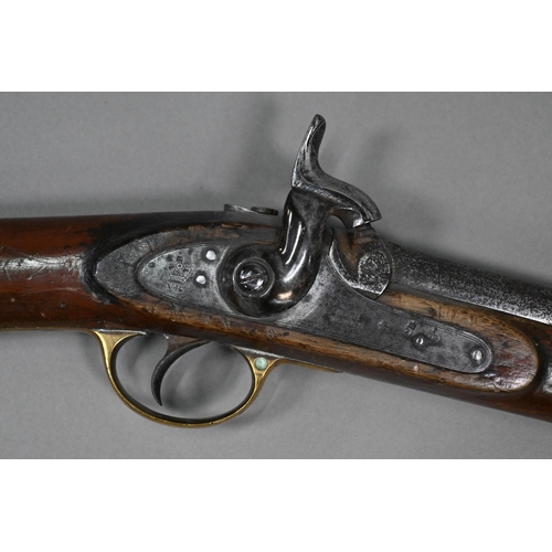 957 - An 1858 pattern 'Tower' musket with percussion action 82 cm barrel, brass-mounted walnut half-stock,... 