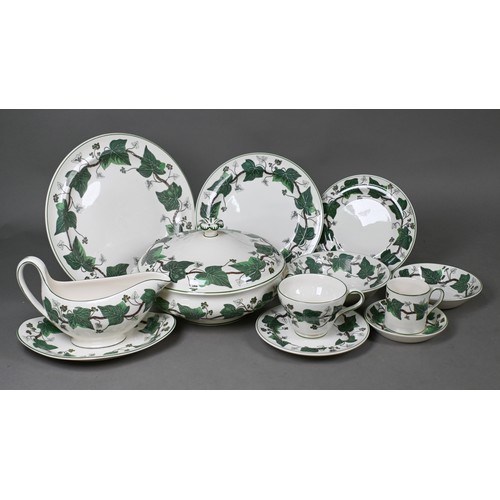 494 - An extensive Wedgwood 'Napoleon's Ivy' dinner/tea service (140 pieces including covers)