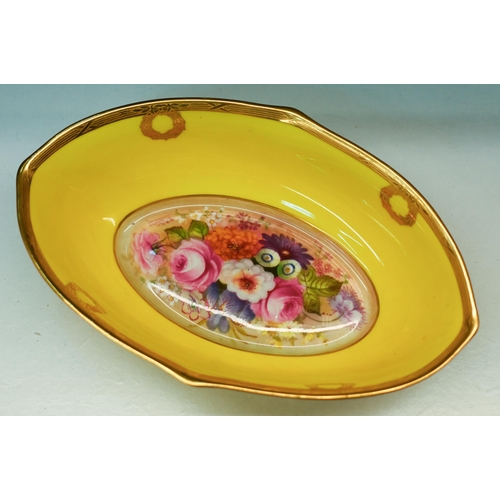 482 - A Royal Worcester oval bowl, painted with flowers by Edward Phillips, signed, on yellow ground, the ... 