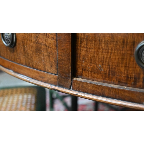 675 - A Victorian mahogany library drum table, the gilt tooled tan leather inset revolving top with four a... 