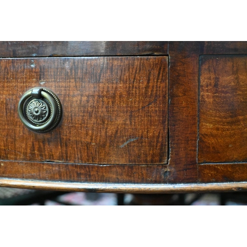 675 - A Victorian mahogany library drum table, the gilt tooled tan leather inset revolving top with four a... 