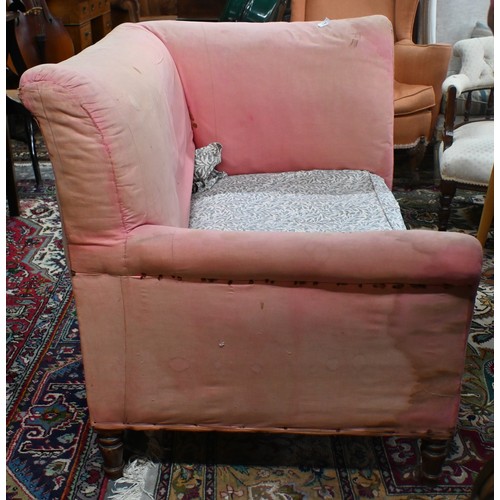 740 - An antique Dutch love-seat / corner armchair with one low arm, on turned supports, 102 cm wide, for ... 