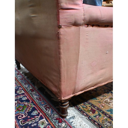 740 - An antique Dutch love-seat / corner armchair with one low arm, on turned supports, 102 cm wide, for ... 