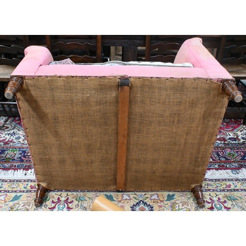 740 - An antique Dutch love-seat / corner armchair with one low arm, on turned supports, 102 cm wide, for ... 