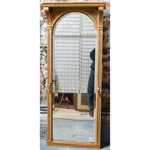 655 - An Victorian style giltwood framed canopy top pier glass, with bevel edged mirror plate, flanked by ... 