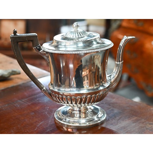 68 - A George III heavy quality silver urn-shaped teapot, the lift-off cover with reeded dome and ball fi... 