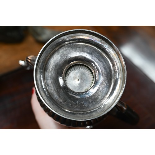 68 - A George III heavy quality silver urn-shaped teapot, the lift-off cover with reeded dome and ball fi... 