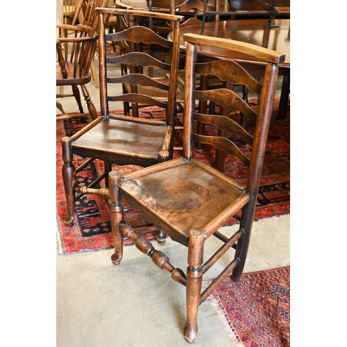 43 - A matched set of six early 19th century provincial ash and elm ladderback dining chairs with panel s... 