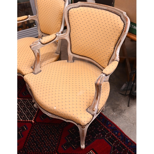 44 - A pair of French painted wood fauteuil armchairs with spotted yellow padded upholstery (2)