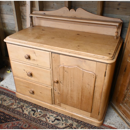 196 - A Victorian pine three drawer and single door low dresser, on a plinth base, 121 cm x 58 cm x 110 cm... 