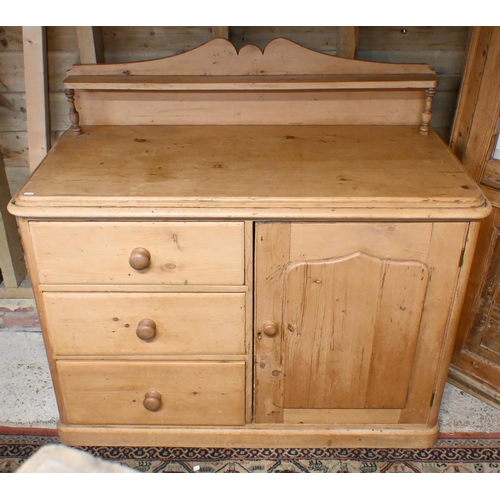 196 - A Victorian pine three drawer and single door low dresser, on a plinth base, 121 cm x 58 cm x 110 cm... 