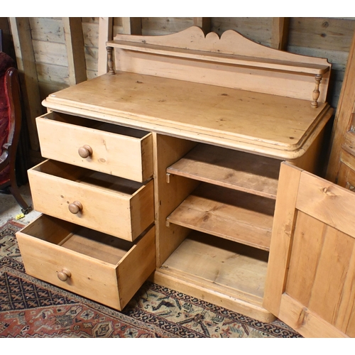 196 - A Victorian pine three drawer and single door low dresser, on a plinth base, 121 cm x 58 cm x 110 cm... 