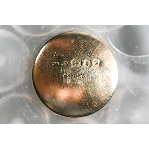 460 - Asprey - a round lucite sliding pill box with six recesses, vermeil edging and silver gilt centres, ... 