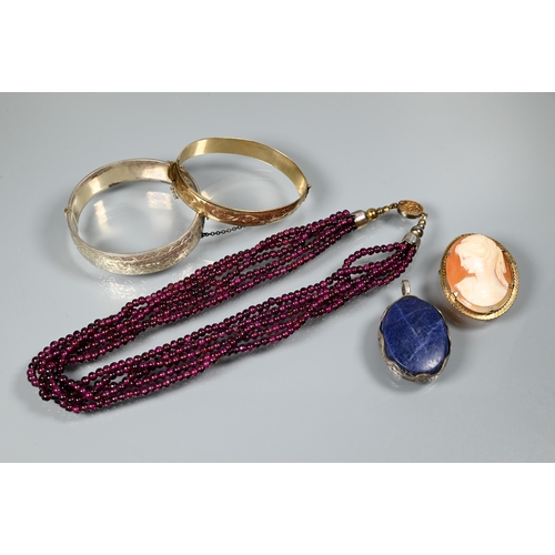 461 - Mixed jewellery including multistrand ruby beads, cameo, two bangles and a lapis lazuli pendant