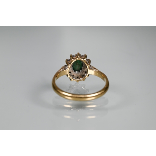 465 - A green and white stone cluster ring, 9ct yellow gold set, size N 1/2, approx 2.7g all in