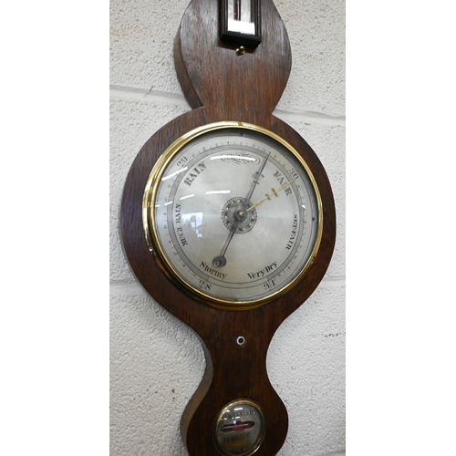 100 - Two unnamed mercurian wheel barometers with silvered dials and registers, one inlaid case, 95 cm and... 