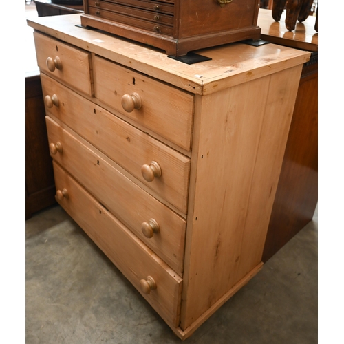 11 - A vintage pine chest of two short over three long drawers raised on bun feet, 98 cm x 46 x 100 cm hi... 