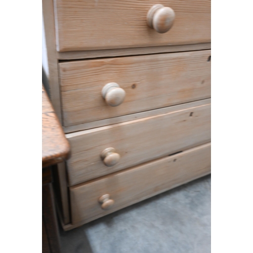 11 - A vintage pine chest of two short over three long drawers raised on bun feet, 98 cm x 46 x 100 cm hi... 