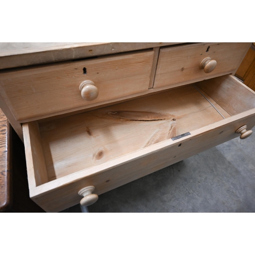 11 - A vintage pine chest of two short over three long drawers raised on bun feet, 98 cm x 46 x 100 cm hi... 