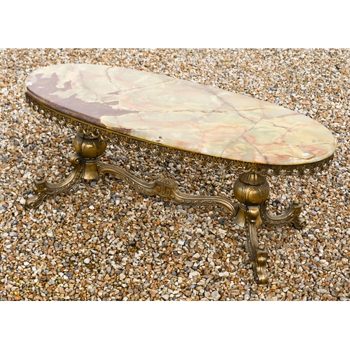 115 - A green onyx and brass oval coffee table, 120 x 50 x 46 cm high