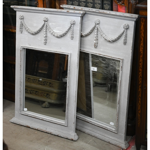 121 - A pair of French style trumeau mirrors in grey painted frames with neoclassical garlands, 50 cm wide... 