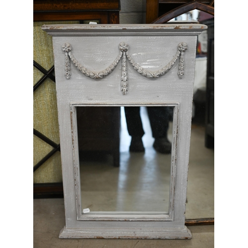 121 - A pair of French style trumeau mirrors in grey painted frames with neoclassical garlands, 50 cm wide... 