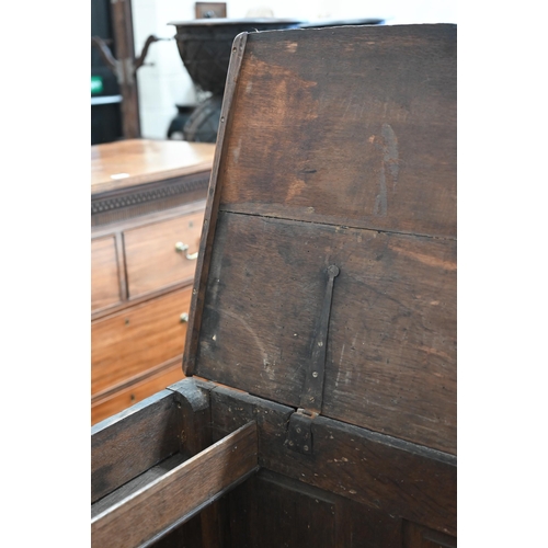 124 - A Georgian oak mule chest, of traditional panelled construction with hinged top and two drawers, 134... 