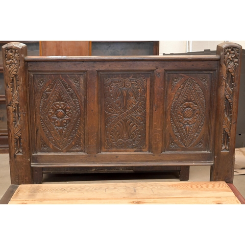 125 - A carved oak single bed (antique and later components) c/w Peter Betteridge Milton 1400 mattress