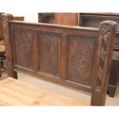 125 - A carved oak single bed (antique and later components) c/w Peter Betteridge Milton 1400 mattress