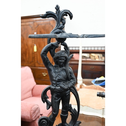 129 - A cast iron figural stick stand to/w five various walking sticks and a two-handled jardiniere with t... 