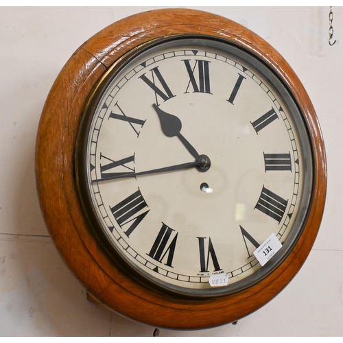 131 - An early 20th century oak cased fusee movement dial clock c/w pendulum and key, 30 cm dial