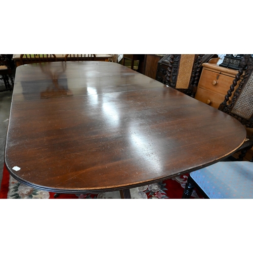 134 - A Regency style mahogany twin pedestal dining table with single central leaf, 200 x 110 x 76 cm high