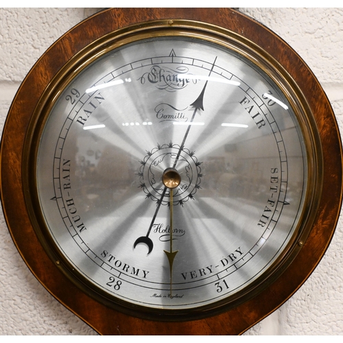 136 - A 'Comitti, Holborn' inlaid mahogany wheel barometer with silvered dials, 94 cm high