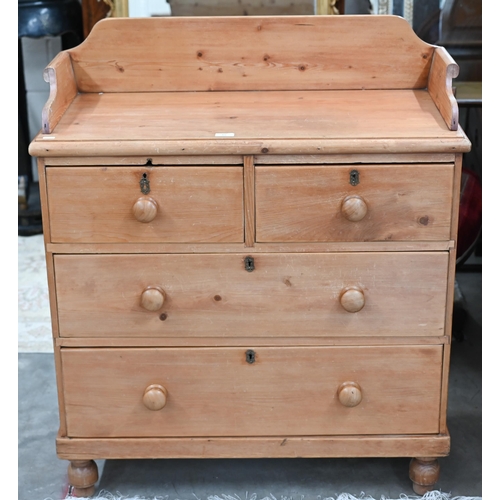 15 - A Parana pine chest with galleried top over two short and two long drawers on turned feet, 90 x 104 ... 