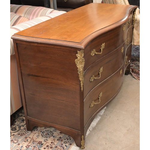 151 - A French style brass mounted commode trunk with serpentine front and hinged top and three dummy draw... 