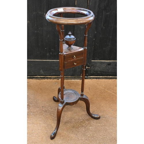 153 - A mahogany shaving stand with two drawers on triform suports, 186 cm