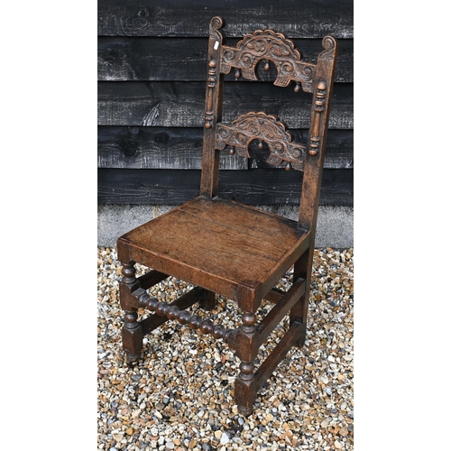 167 - A small oak bowfront hall table with drawer and open undertier, 64 x 22 x 70 cm high to/w a carved o... 